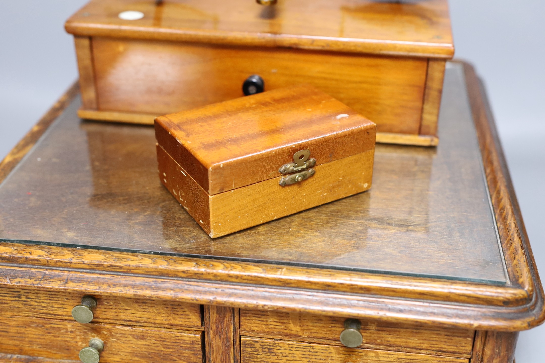A Victorian oak instrument stand and a set of Stanley scales with weights
